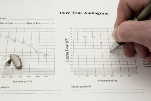 Picture of someone completing an audiogram test