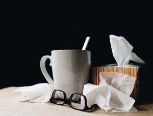 Image of tea, glasses, Kleenex.